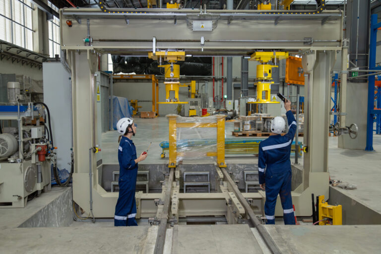 factory-workers-operating-industrial-machine-in-ma-2026-01-08-22-11-10-utc-scaled